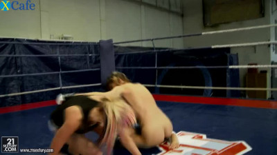 Naked lesbian chick Leyla Black fights another lezzie on the ring