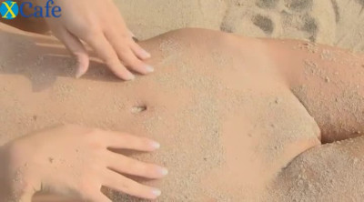 Pretty Asian wench Rika Nonomiya likes hot webcam action on sandy beach