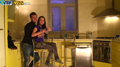 Raven haired slim chick Emmy pleases her horny man with solid blowjob at kitchen