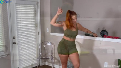 Hot sporty redhead with big ass is happy to use sex toys during sport time