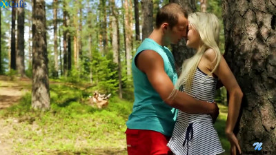 Romantic slender blonde girl is eager to be fucked doggy right in the forest