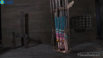 Ruined red-haired whore gets suspended upside down