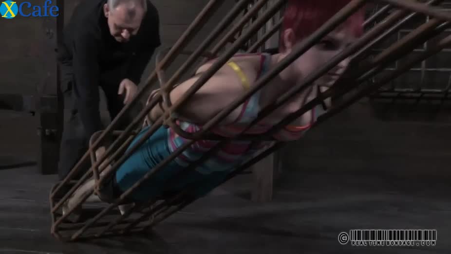 Watch Frisky red-haired hussy gets her body locked in huge metal cage Free Porn Videos | ePornRest.