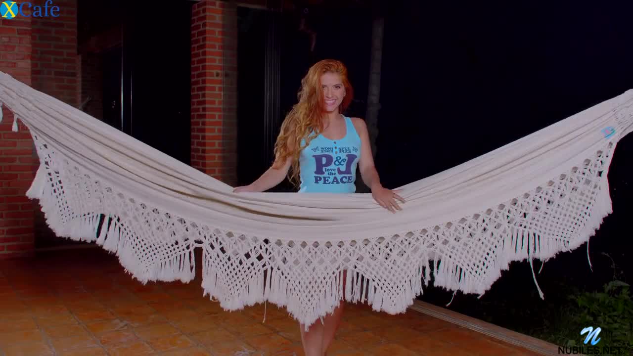 Watch Sweet bright redhead Angelina Praga fingers her wet pussy in the hammock Free Porn Videos | ePornRest.