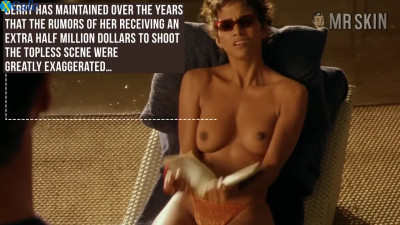 Doing some sunbathing topless scene hot Halle Berry flashes her titties