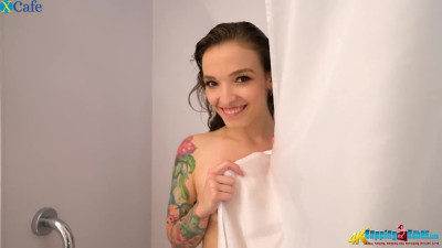 Taking a shower tattooed chick Kylie Nymphette loves exposing her ass