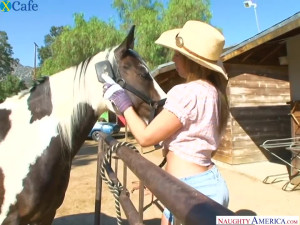 Ardent beauty in cowgirl hat goes interracial to be pounded doggy hard