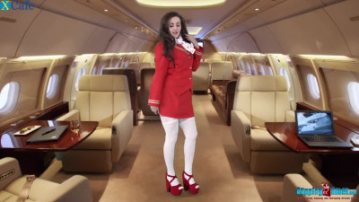 Sexy stewardess Georgie starts stripping and flashing tits on board