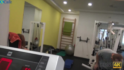 Sporty girl with natural titties gets shaved pussy fucked in the gym hall