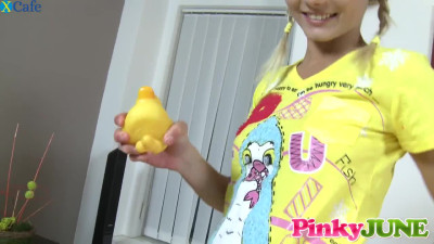 Pinky June uses a yellow duck-toy and pets her hungry pussy a bit