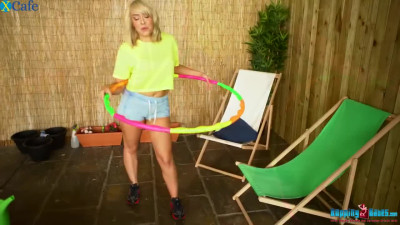 Naturally stacked temptress Millie Rose is doing her hula hooping naked