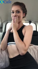 Cute teen masturbates in a car standing in the parking lot