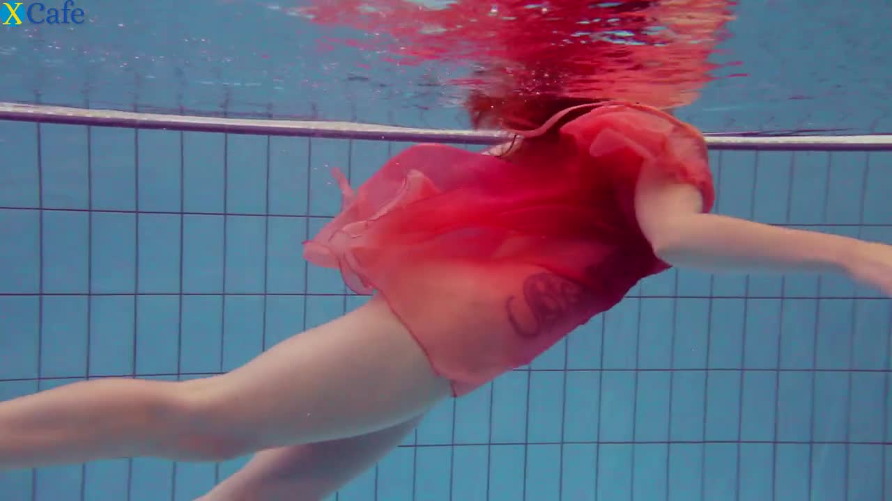 Watch Fire red haired girl Katrin Privsem swimming naked in a pool Free Porn Videos | ePornRest.