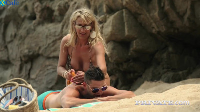 Sex on the beach with alluring blonde MILF Lana Vegas